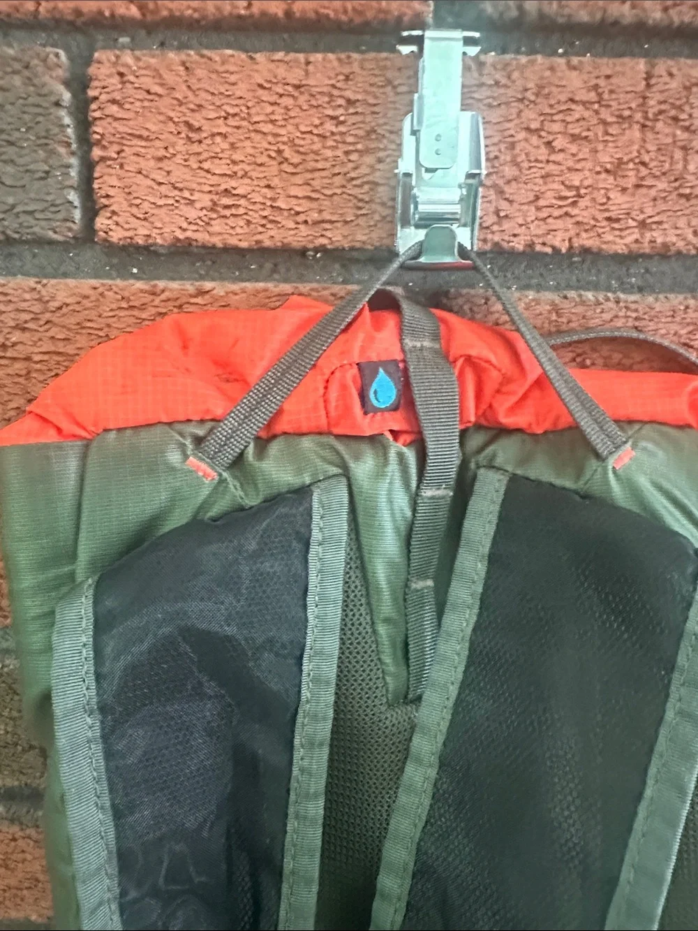 Thule Olive Green Roll-Top Backpack with Orange Interior STIR15